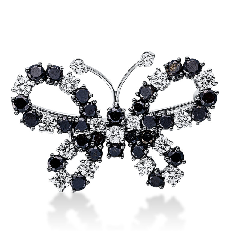 Brosche 18 kt WG, Fassung teils schwarz rhodinie